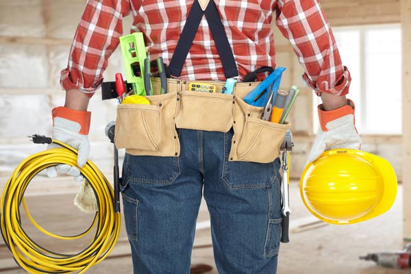 worker with large electrical extension cord